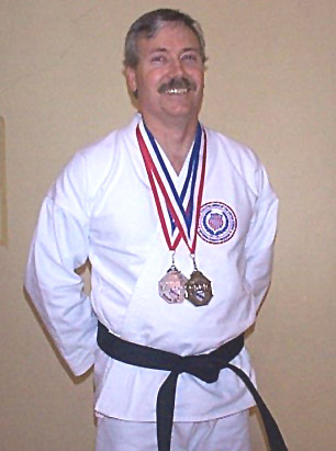 SENSEI TOM STORY WITH HIS MEDALS