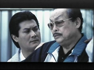 Alan Tang with his father