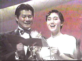 Alan Tang and Gong Li