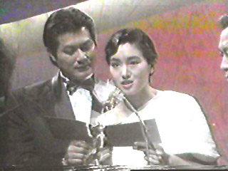 Alan Tang and Gong Li