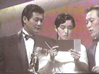 Alan Tang and Gong Li